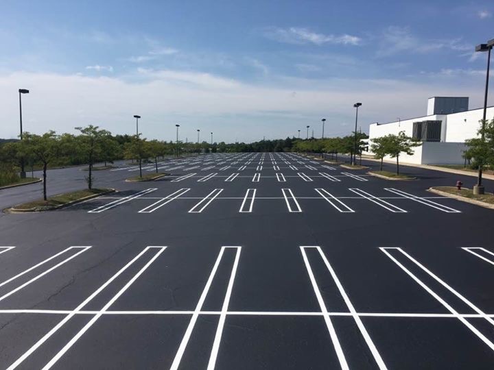 Parking lot with pavement striping with Action Pavement Striping & Maintenance in Southeast Michigan