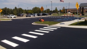 Safety hazard pedestrian striping by Action Pavement Striping & Maintenance