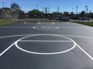 Professional Basketball Court Striping by Action Pavement Striping & Maintenance