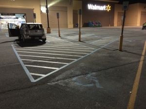 Before: Old handicap parking paint for parking lot 