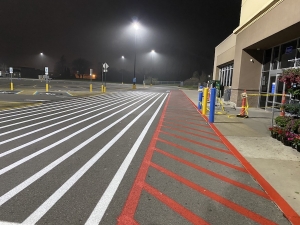 Side angle of Walmart parking lot striping by Action Pavement Striping & Maintenance