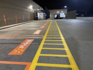 Walmart parking lot striping by Action Pavement Striping & Maintenance
